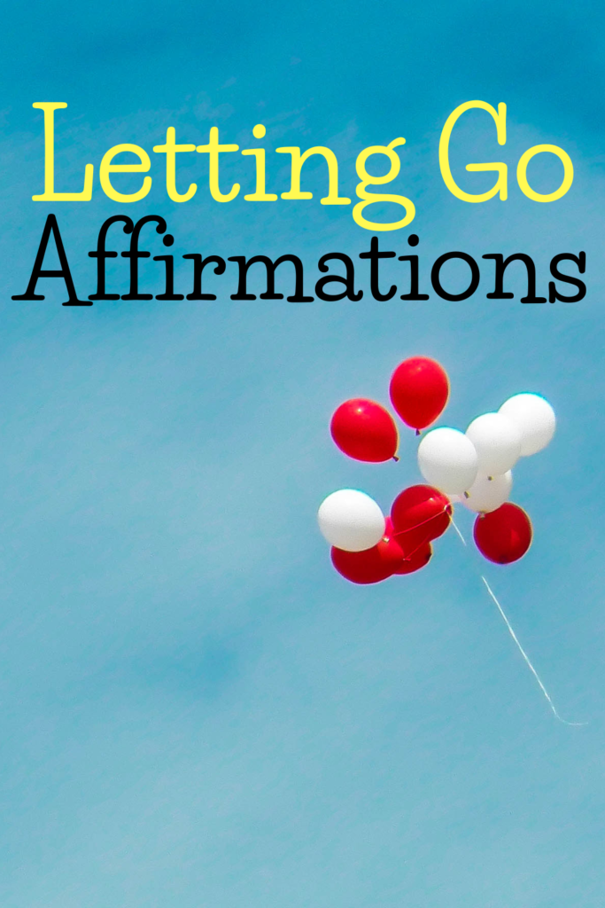 letting go affirmations with red and white balloons flying in the sky.