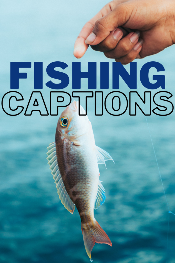 fishing captions with hand holding a fish on a fishing line. 